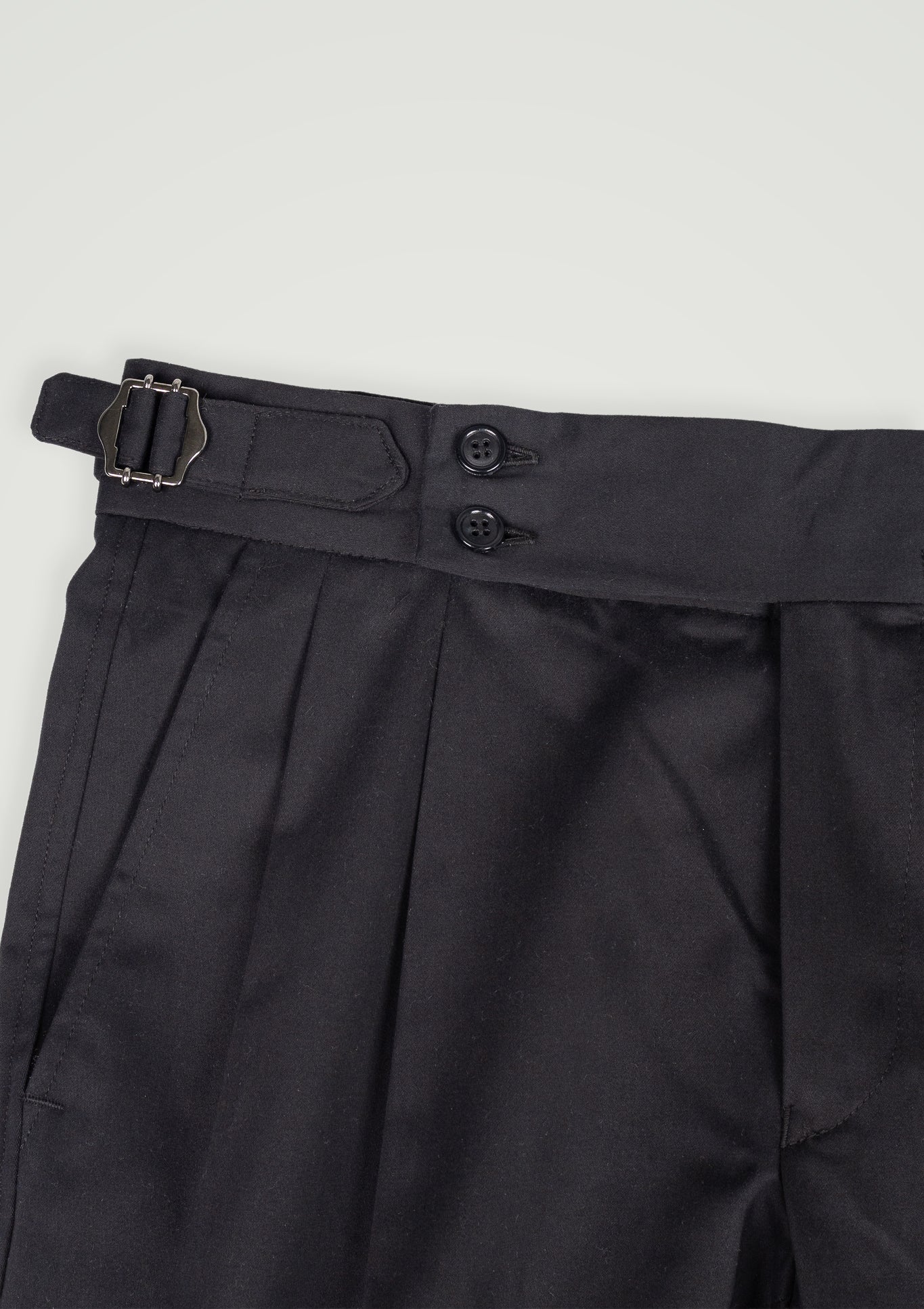 BLACK COTTON TROUSERS WITH PLEATS AND SIDE ADJUSTERS
