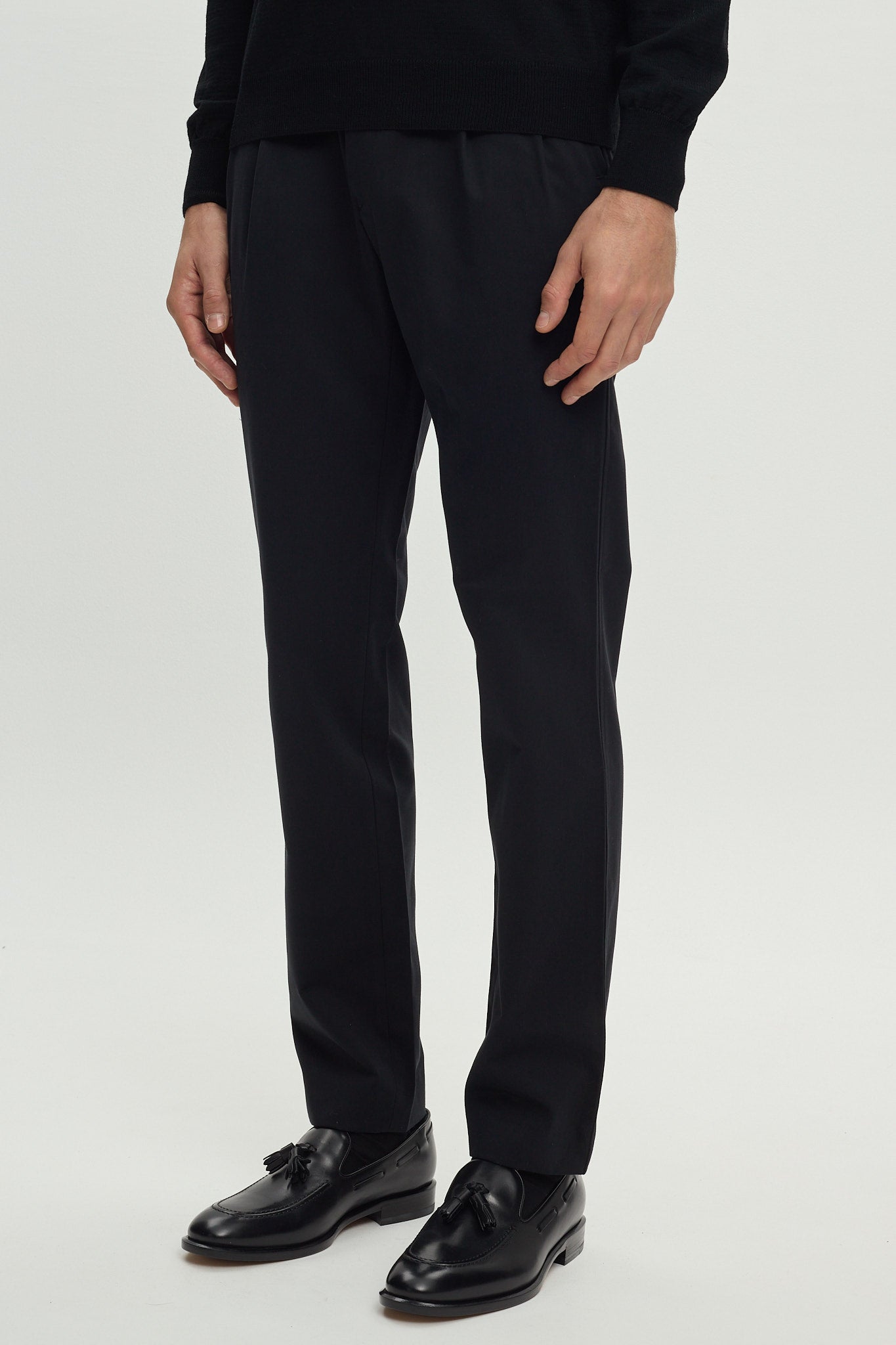 BLACK COTTON TROUSERS WITH PLEATS AND SIDE ADJUSTERS