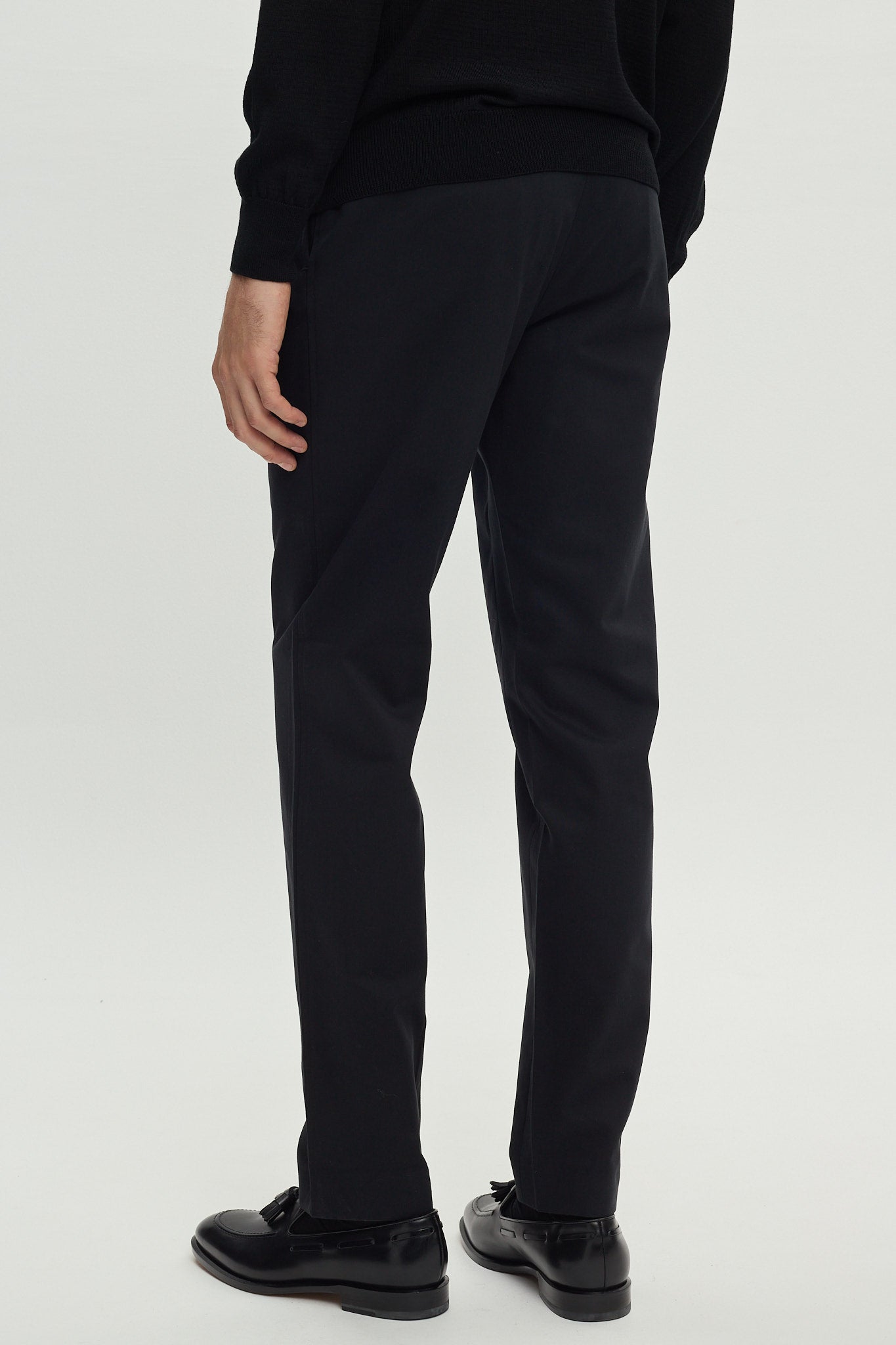 BLACK COTTON TROUSERS WITH PLEATS AND SIDE ADJUSTERS