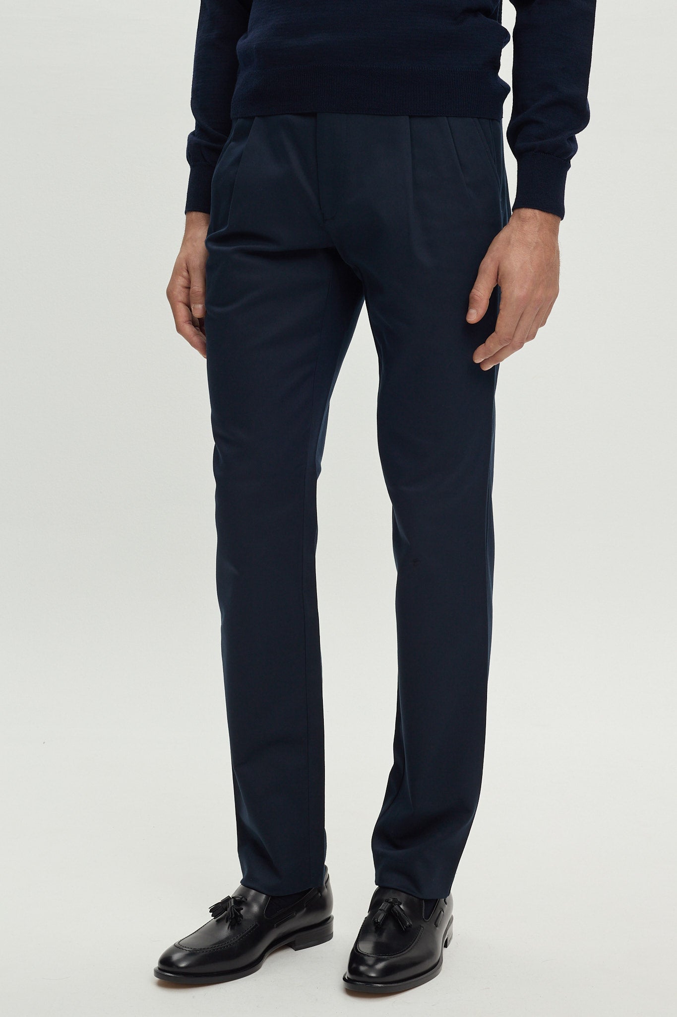 BLUE COTTON TROUSERS WITH PLEATS AND SIDE ADJUSTERS