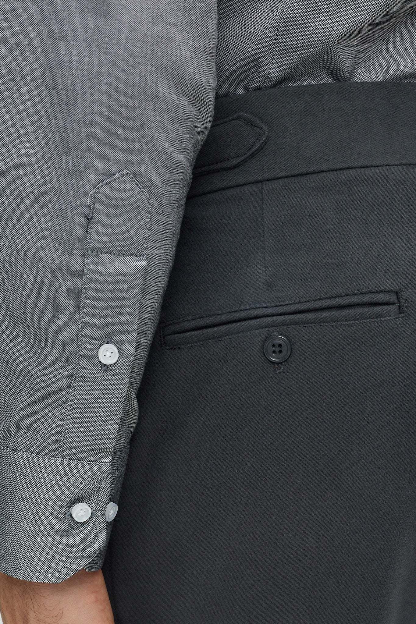 GREY COTTON TROUSERS WITH PLEATS AND SIDE ADJUSTERS